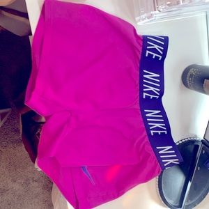 Magenta and plum color Nike pros. (Smoke free household)